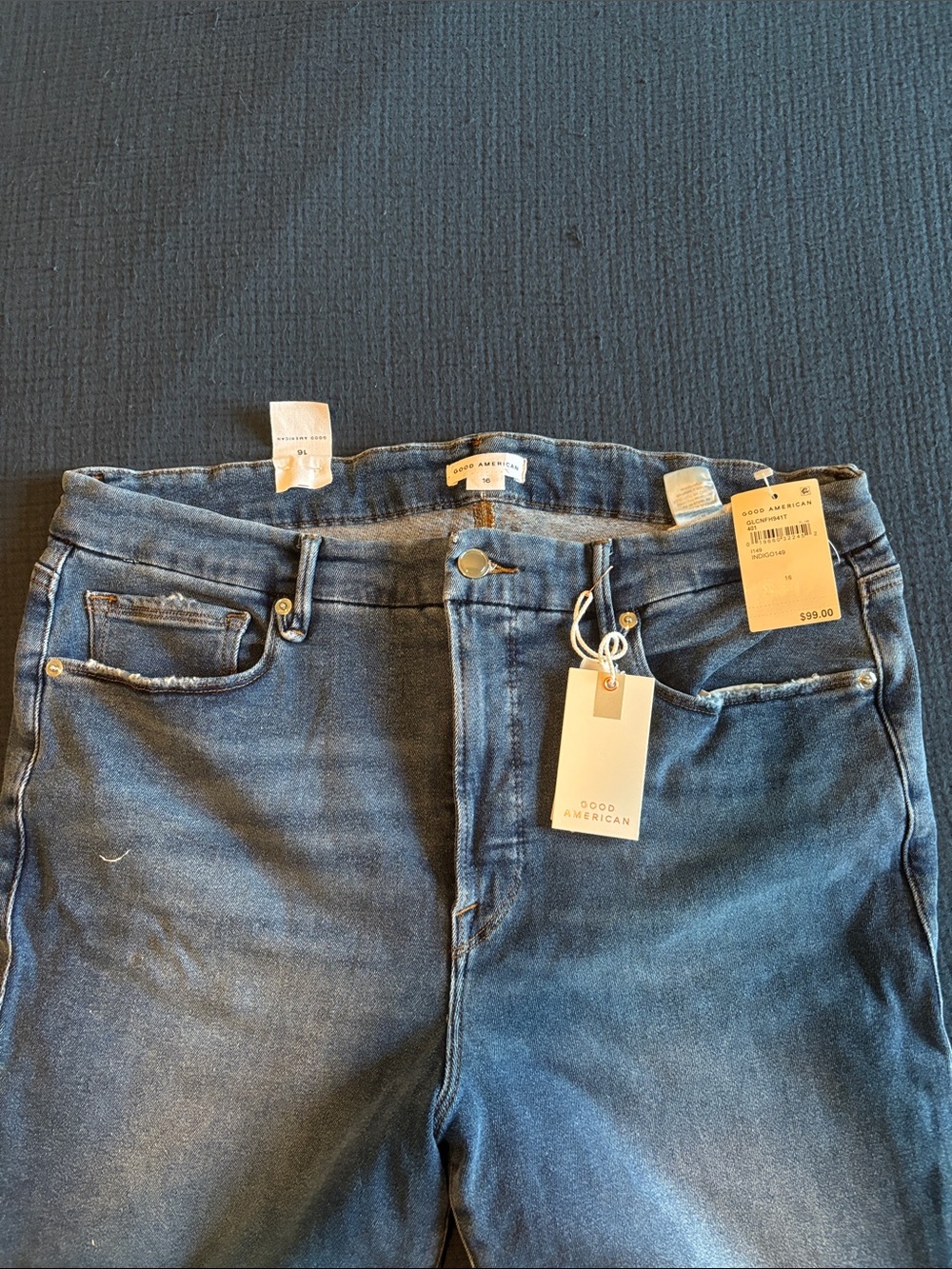 Good American Mid to Dark Blue High-Rise Jeans